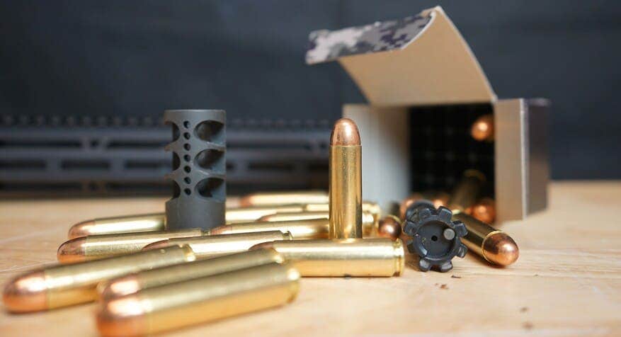 450 Bushmaster ammo on table