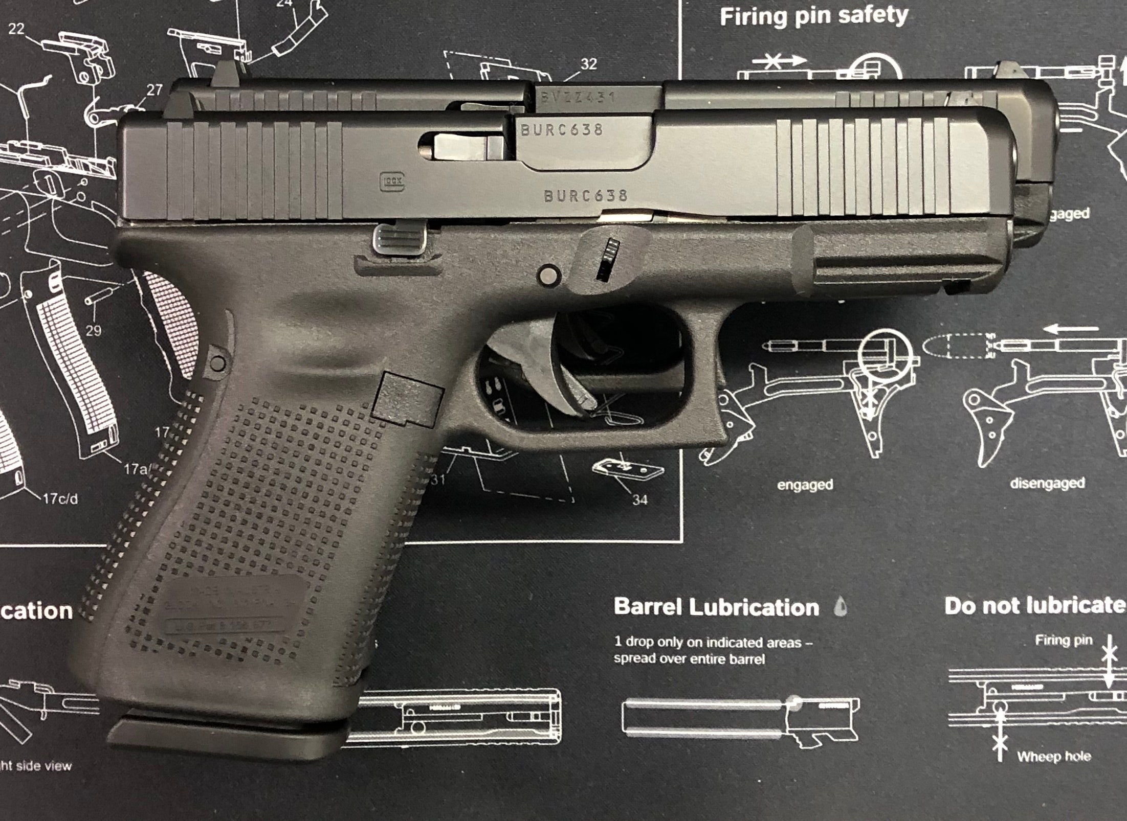 Glock 17 and Glock 19 stacked to show length difference