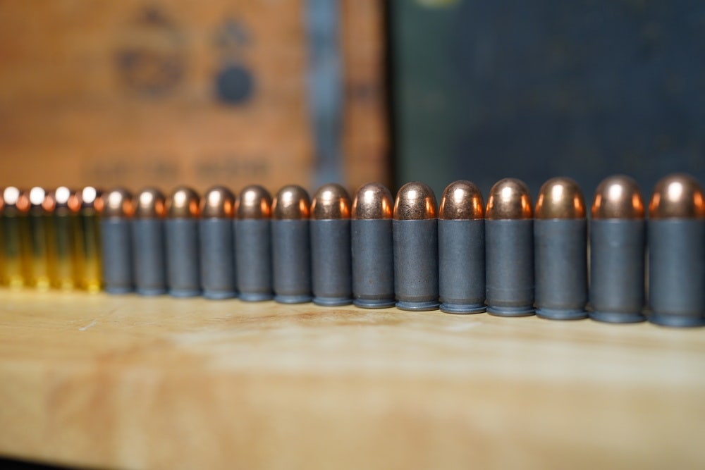 45 ACP ammo lined up on table