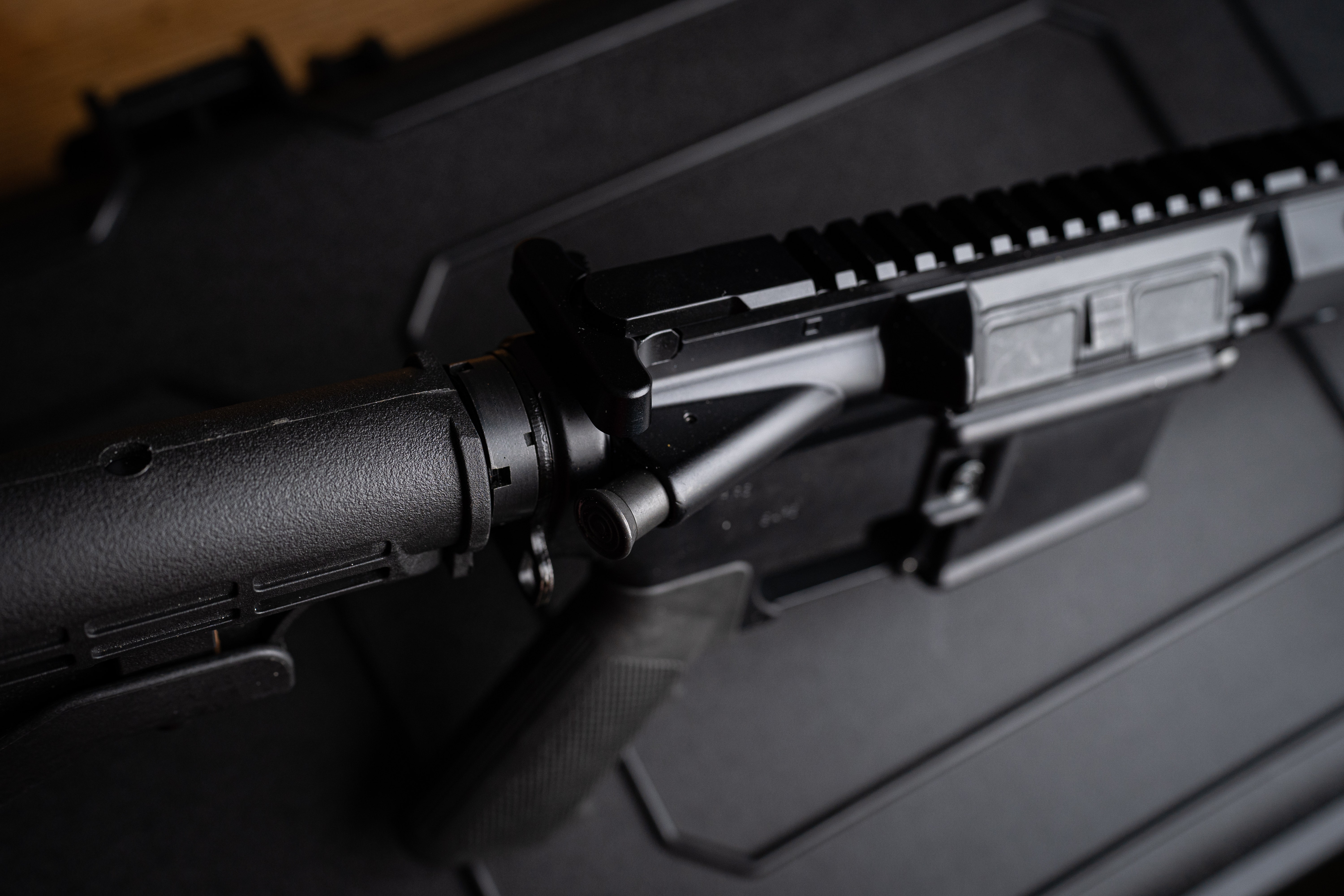 Forward assist next to charging handle