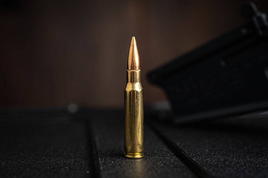 .308 Winchester bullet on table